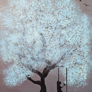 Girl on Swing Beneath Blossoming Tree